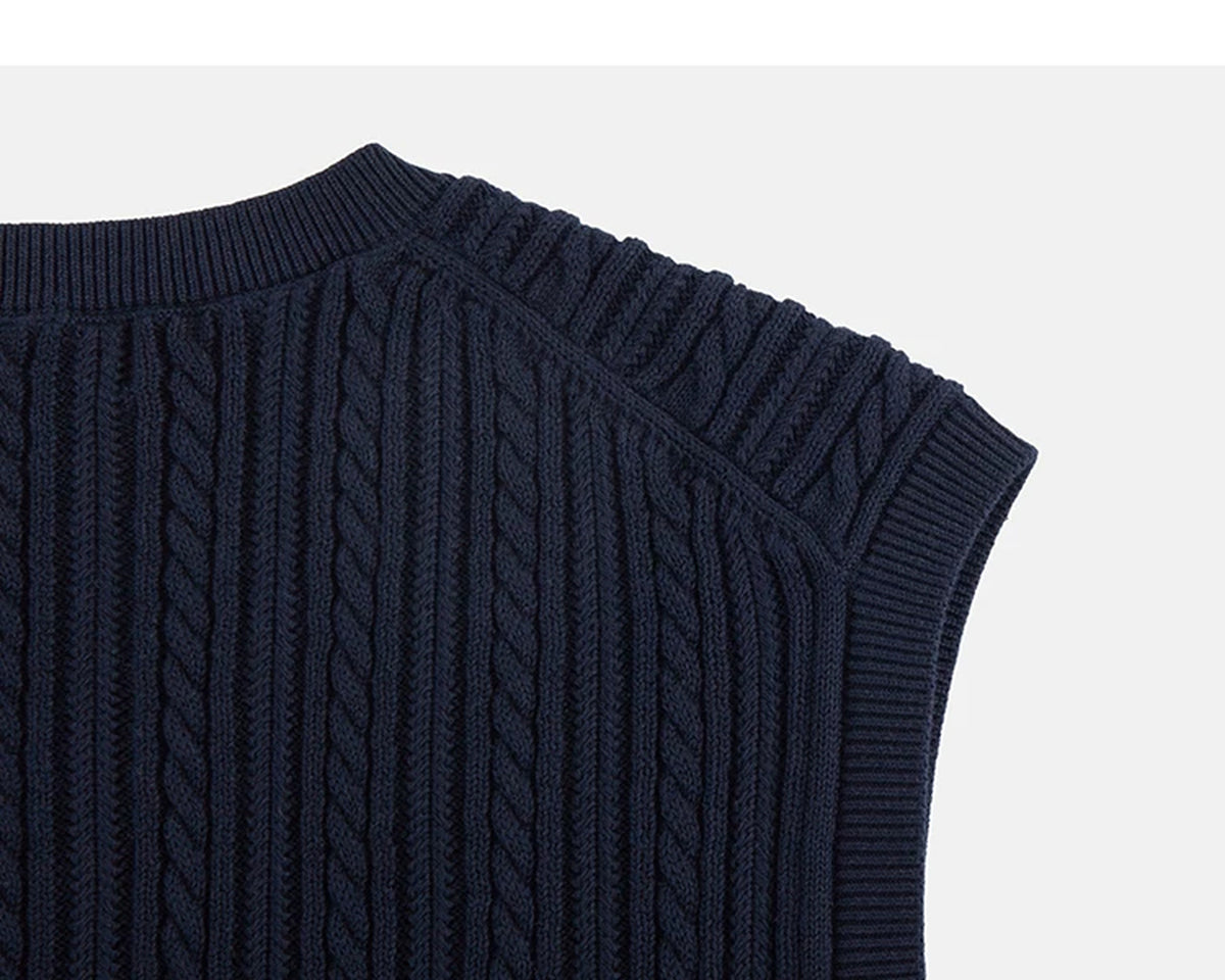IDLT cable knit vest, navy back shoulder.