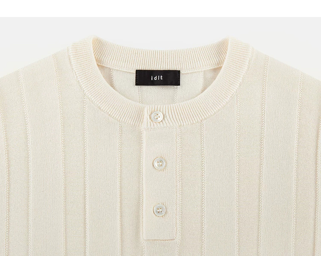 IDLT knit short sleeve henley, cream neckline and buttons.