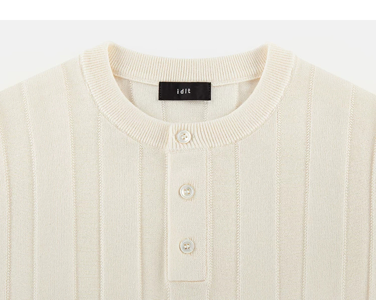 IDLT knit short sleeve henley, cream neckline and buttons.