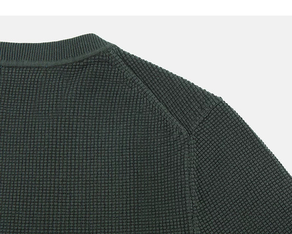 IDLT textured short sleeve sweater, green back shoulder.