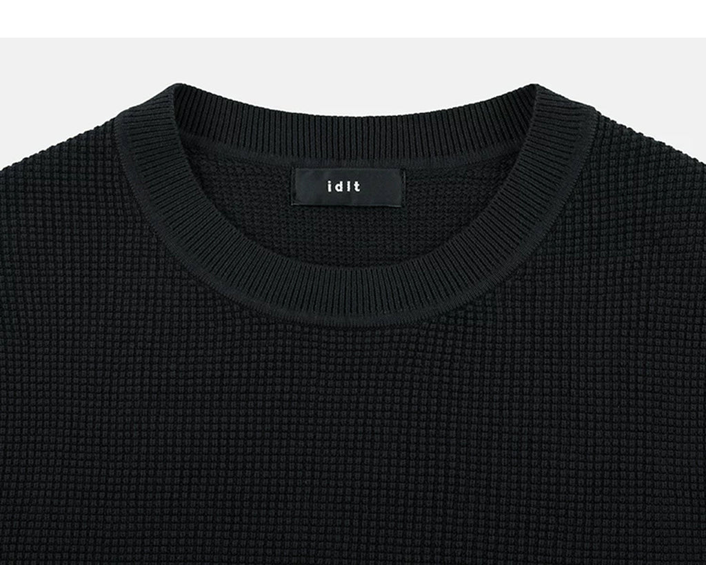 IDLT textured short sleeve sweater, black crewneck.