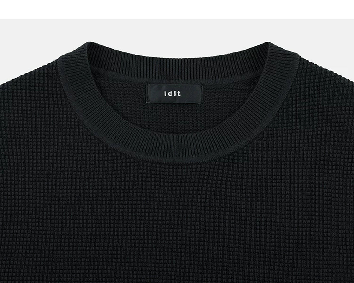 IDLT textured short sleeve sweater, black crewneck.