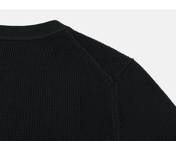 IDLT textured short sleeve sweater, black back shoulder.