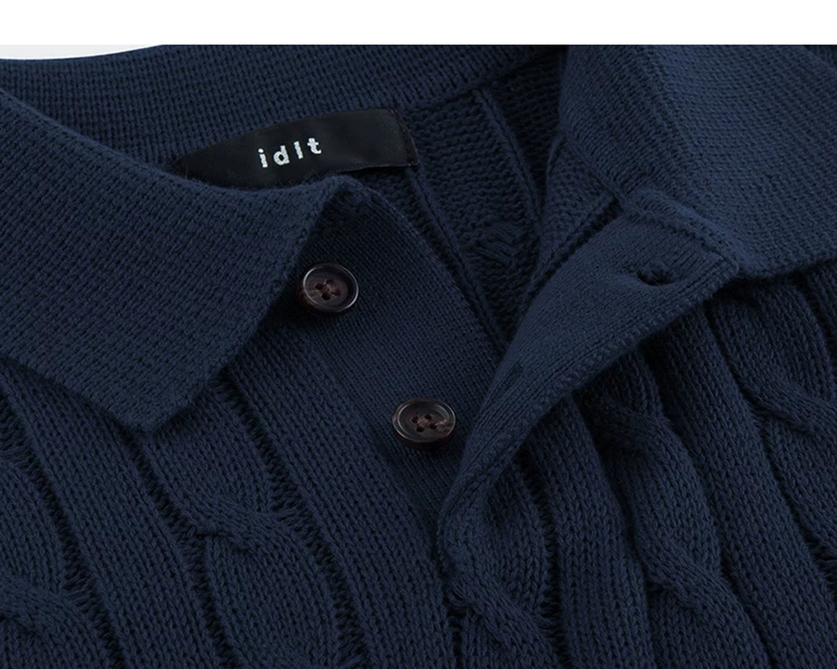 IDLT cable knit polo, navy open placket.