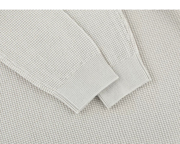 IDLT textured sweater, cream cuffs.