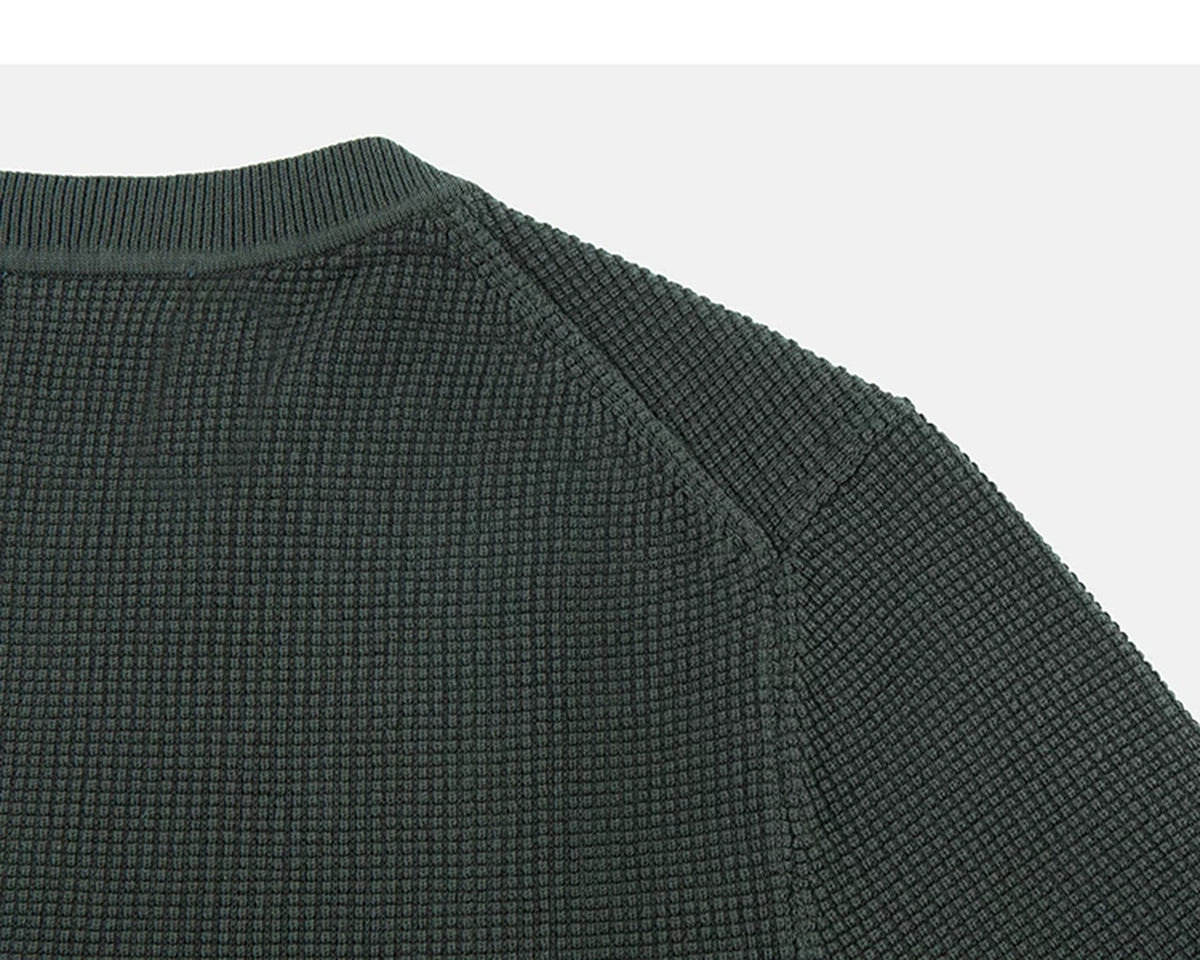 IDLT textured sweater, green back shoulder.