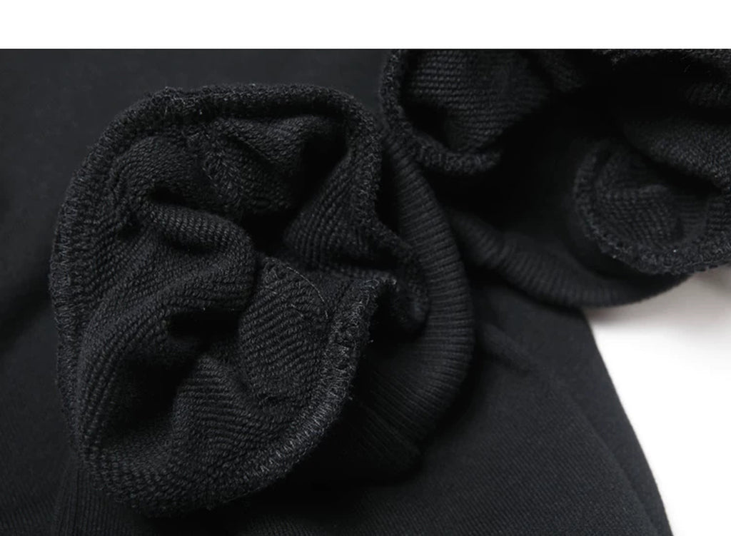 IDLT joggers, black inner cuff stitching.