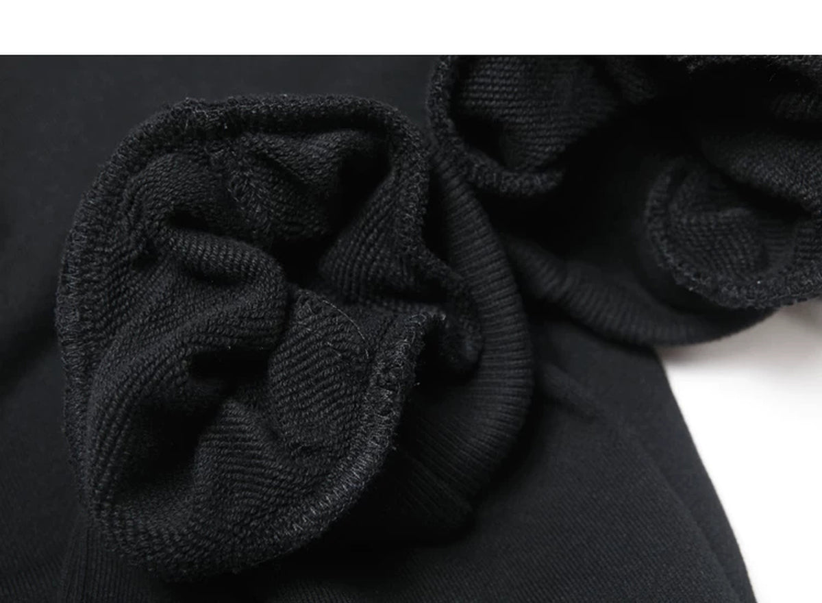 IDLT joggers, black inner cuff stitching.