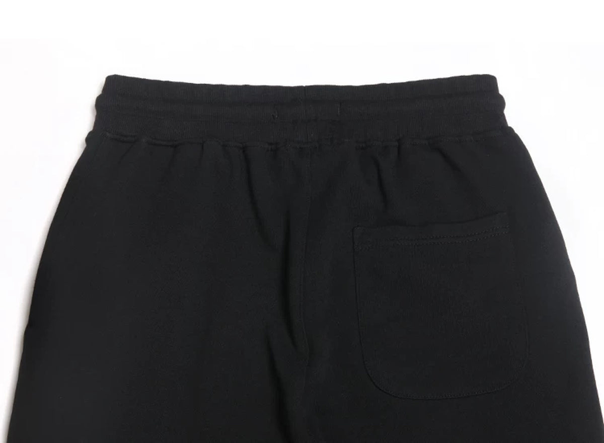 IDLT joggers, black back pocket.