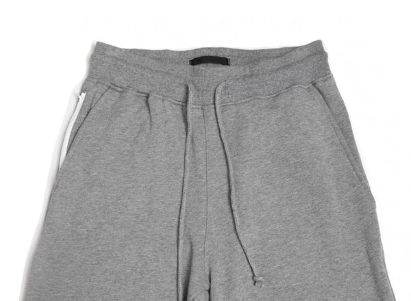 IDLT joggers, gray drawstring waistband.