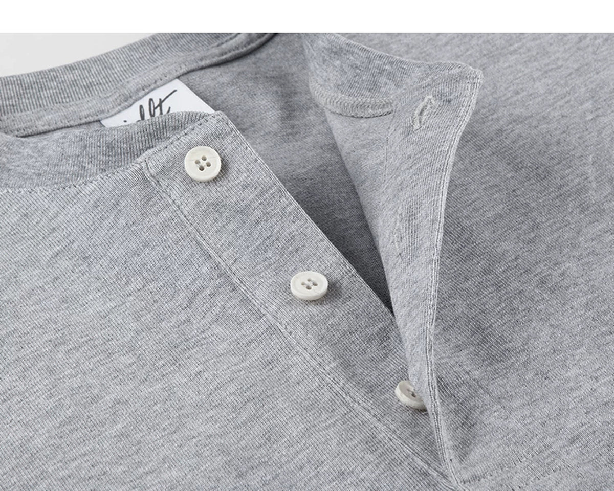 IDLT short sleeve henley, heather gray open button placket.