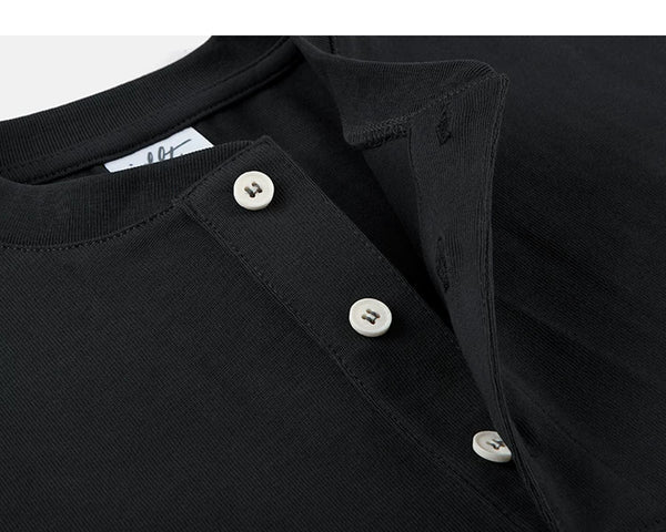 IDLT short sleeve henley, black open button placket.