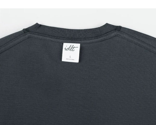 IDLT pocket T-shirt, dark gray back neckline and label.