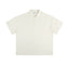 IDLT short sleeve polo, cream front.