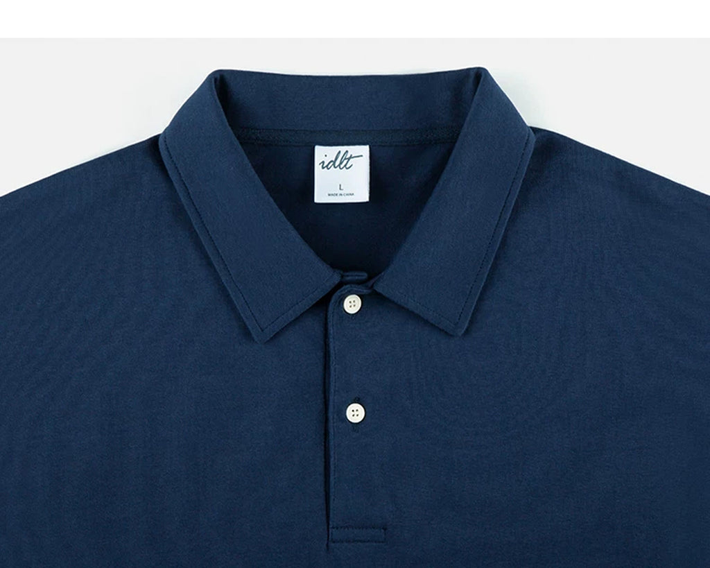 IDLT short sleeve polo, navy collar and buttons.