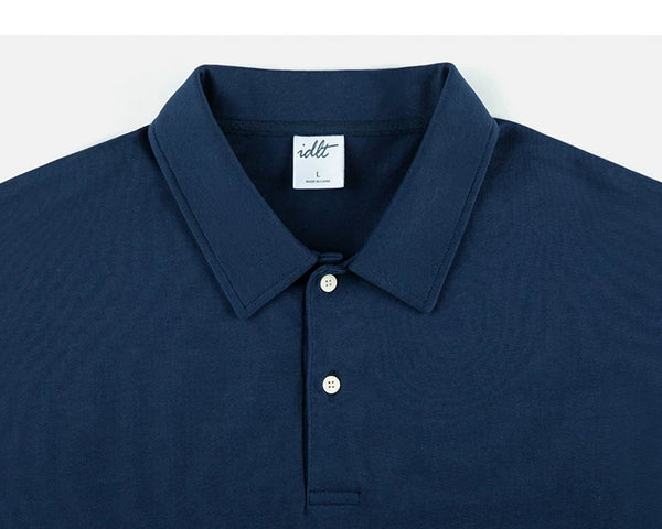 IDLT short sleeve polo, navy collar and buttons.