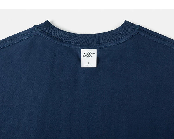 IDLT long sleeve pocket T-shirt, navy back neckline and label.