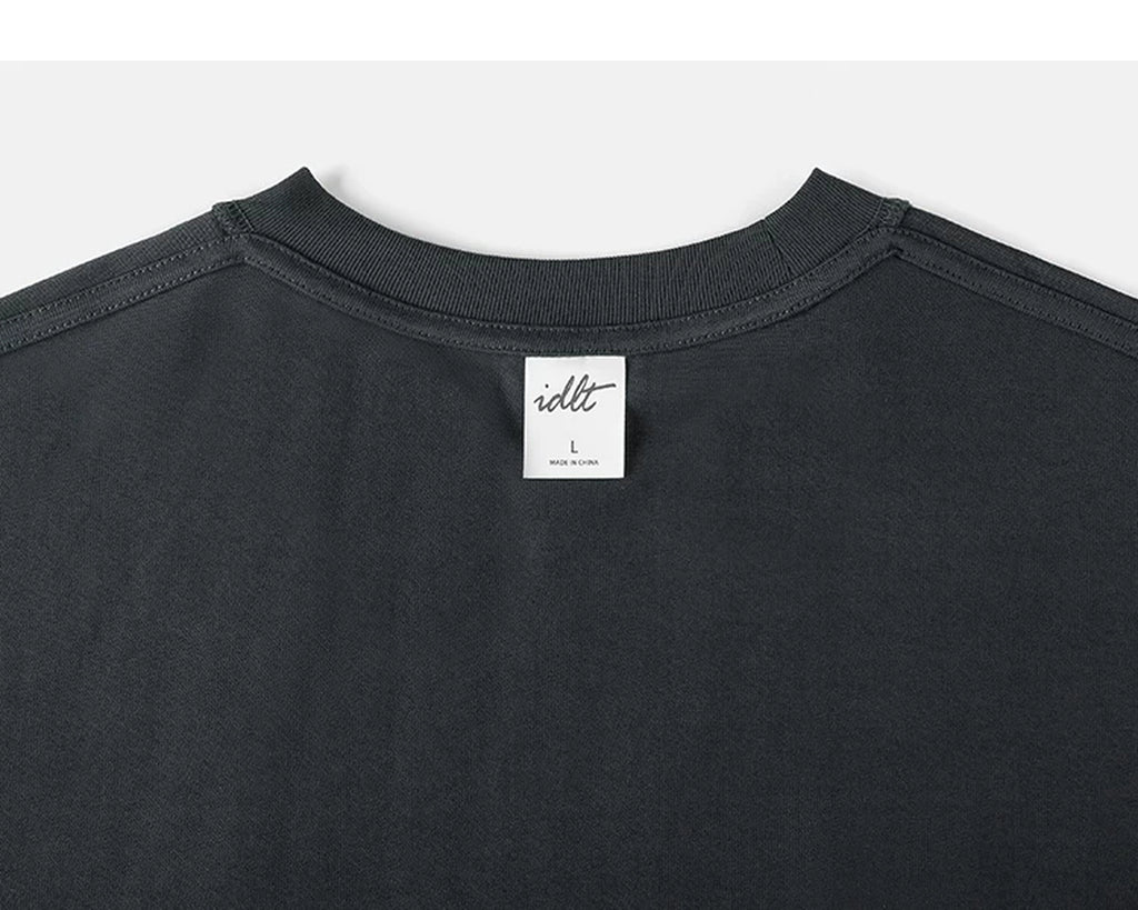 IDLT long sleeve pocket T-shirt, dark gray back neckline and label.