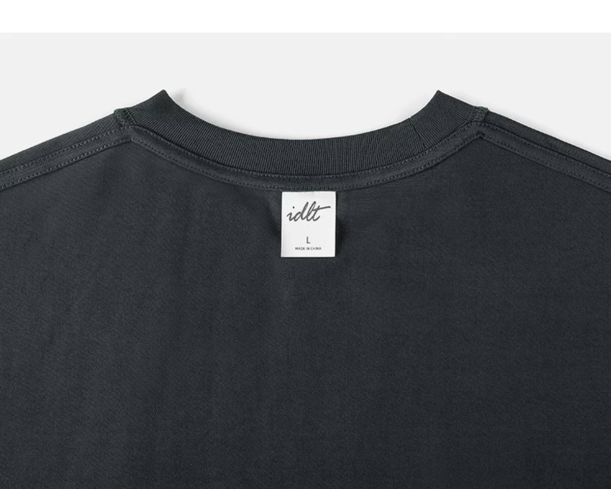 IDLT long sleeve pocket T-shirt, dark gray back neckline and label.